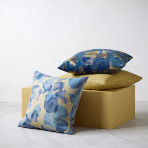 wool pillows and a yellow wooden box