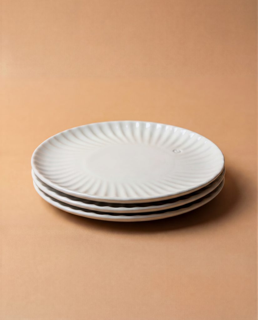 White plate by Elisabeth Kongsrud