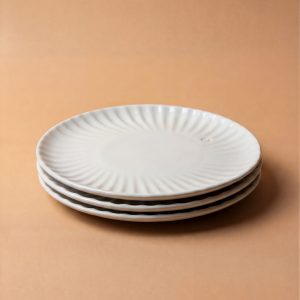 White plate by Elisabeth Kongsrud