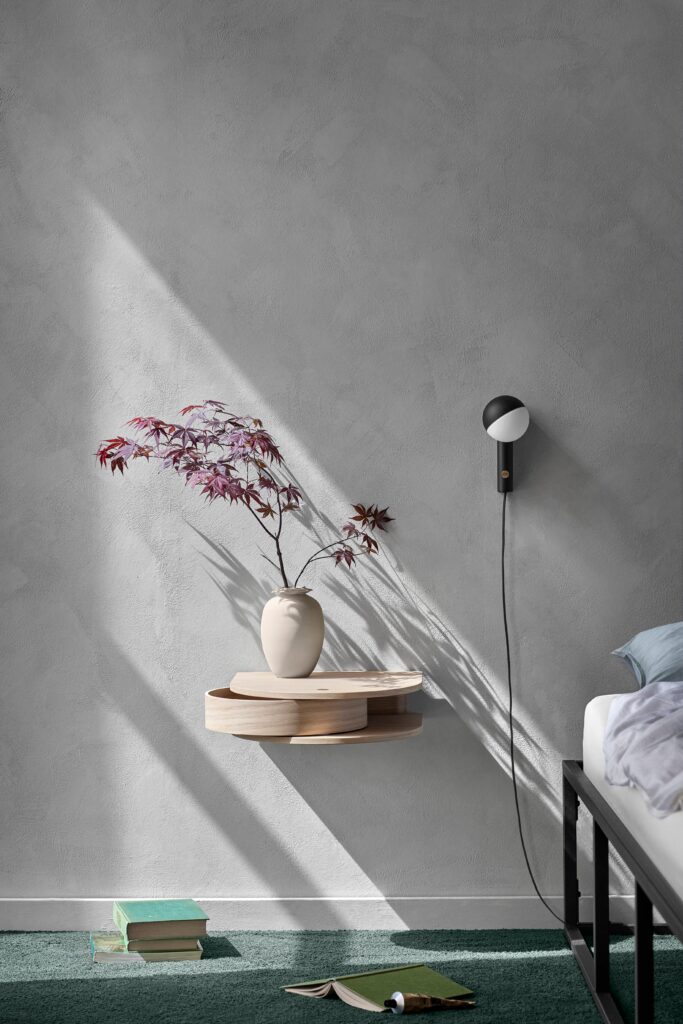 Valet Wall Drawer by Northern, mounted above a bed